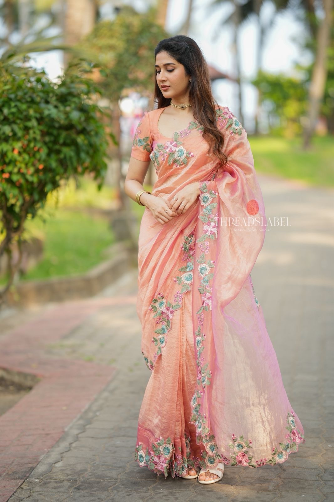 Peach soft tissue saree with embroidery blouse