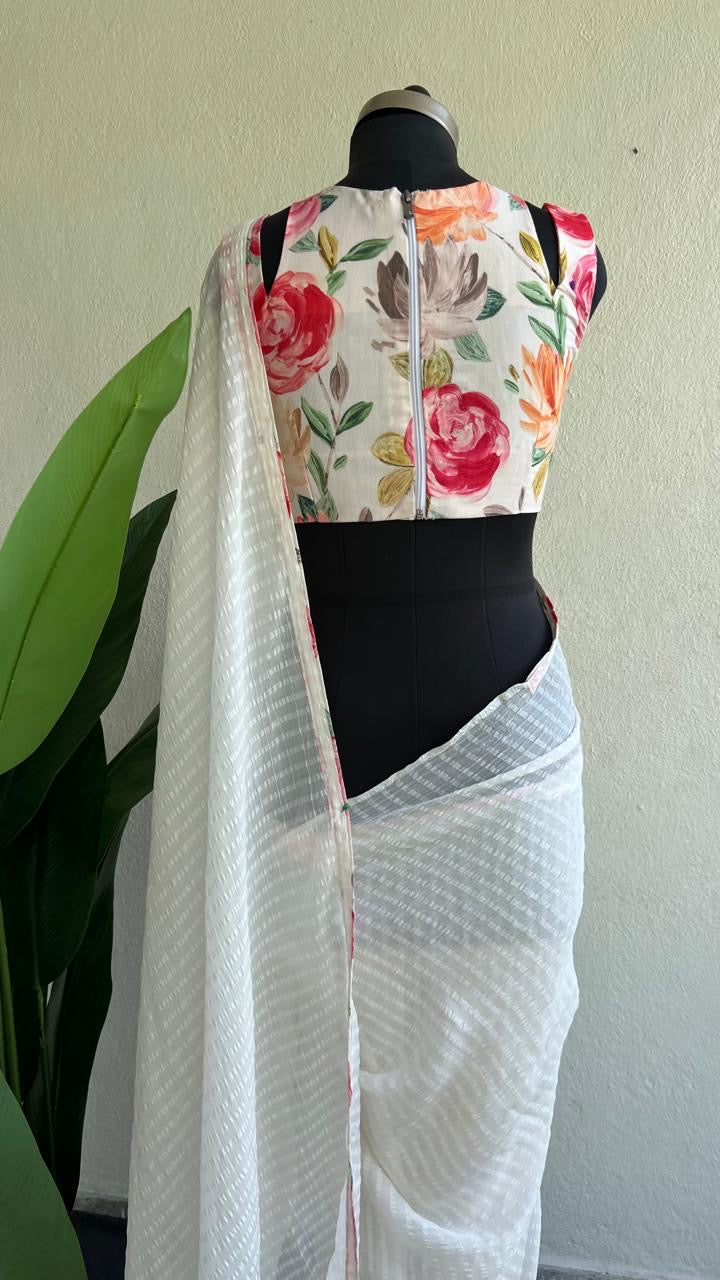 White chiffon saree with floral blouse