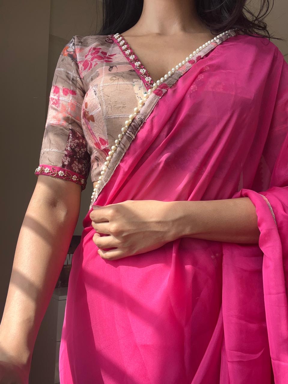 Pink soft organza saree with pearl hand work blouse