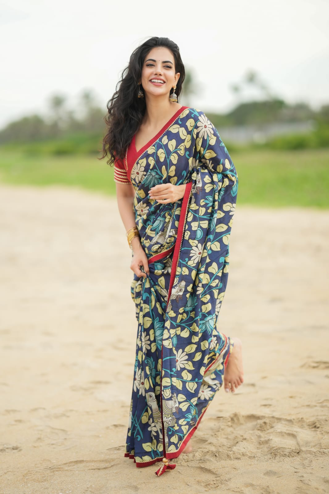 Blue dola silk kalamkari saree with maroon hand work blouse