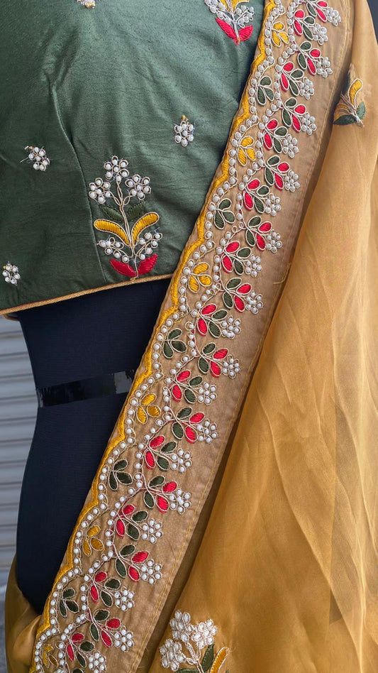 Light orange organza saree with silk embroidery blouse - Threads