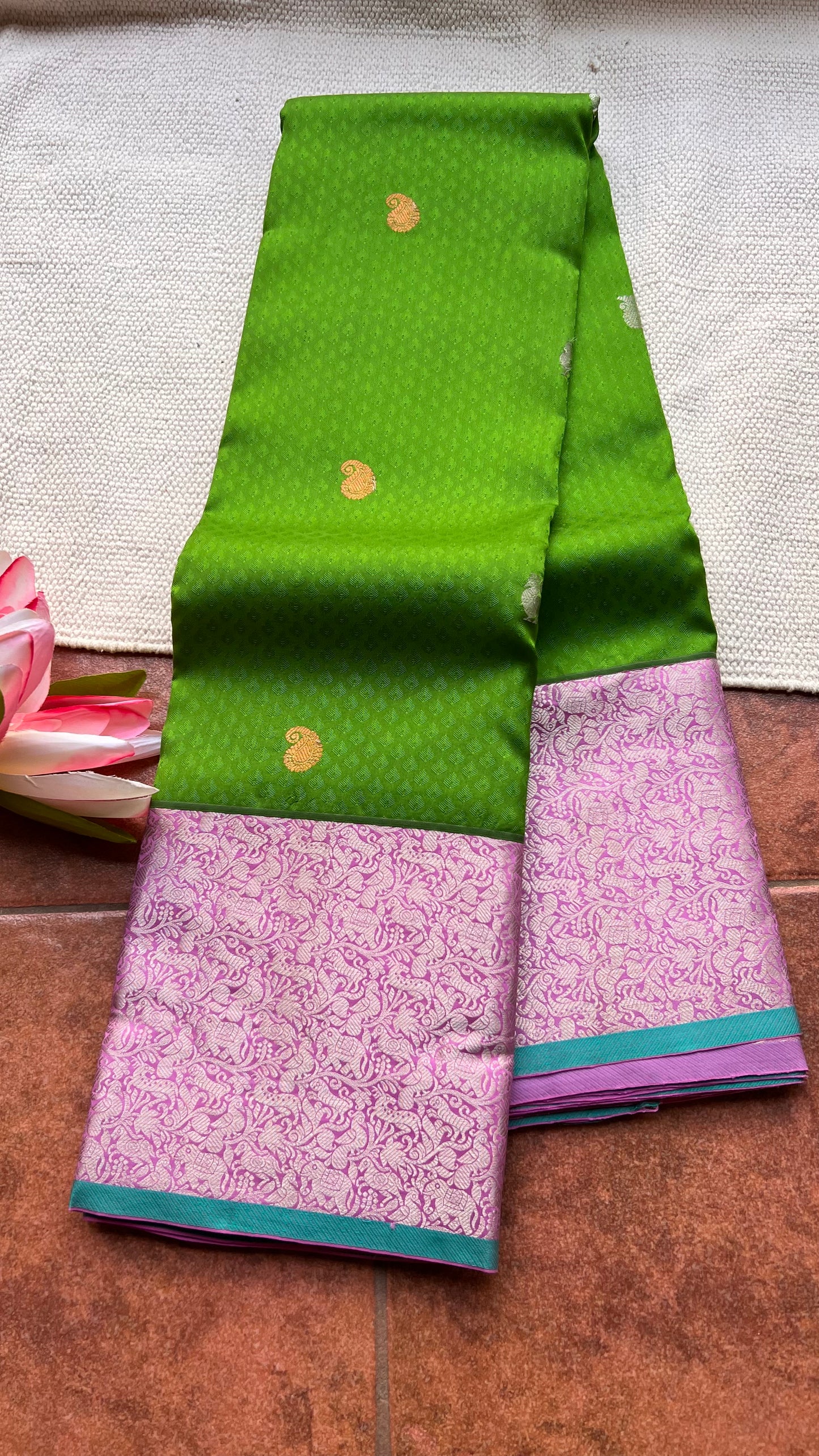 Green and pink kanchipuram silk saree with blouse
