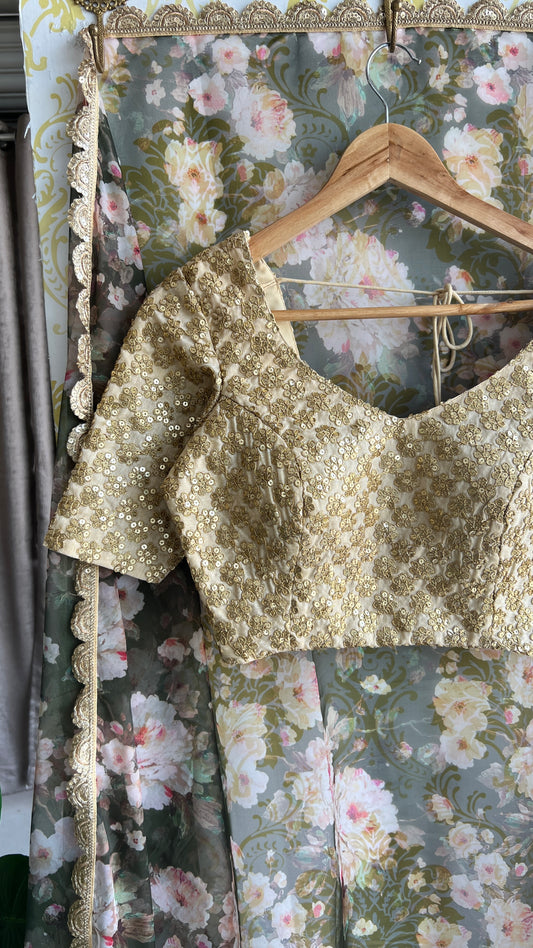 Green floal organza saree with hand worked blouse