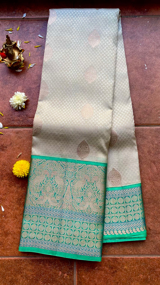Half white and sea green kanjivaram silk saree with blouse - Threads