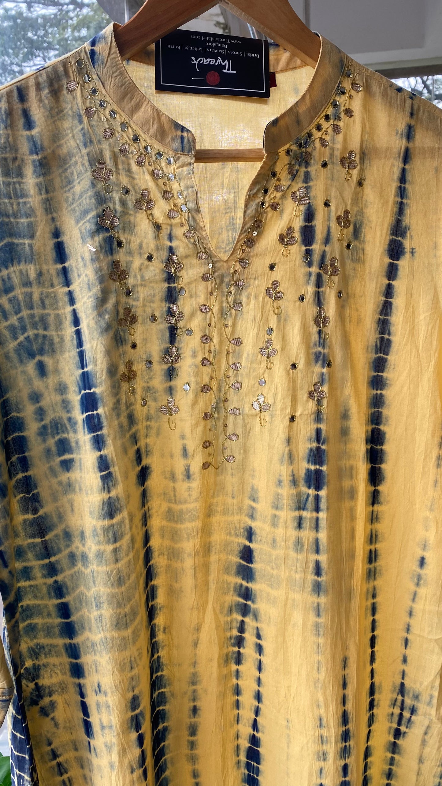 Cream and blue embroidery hand worked kurti top - Threads