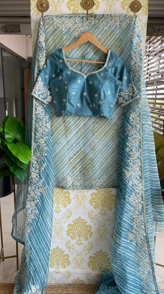 Lehariya Blue organza saree with blue hand worked blouse - Threads