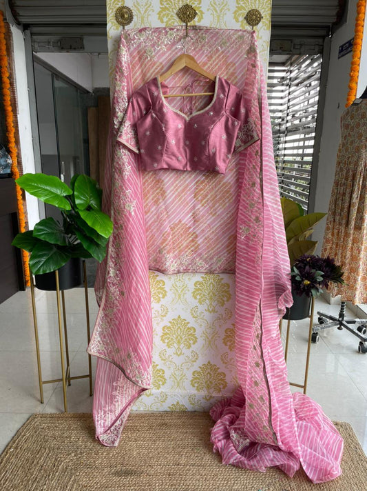 Lehariya pink organza saree with blue hand worked blouse - Threads