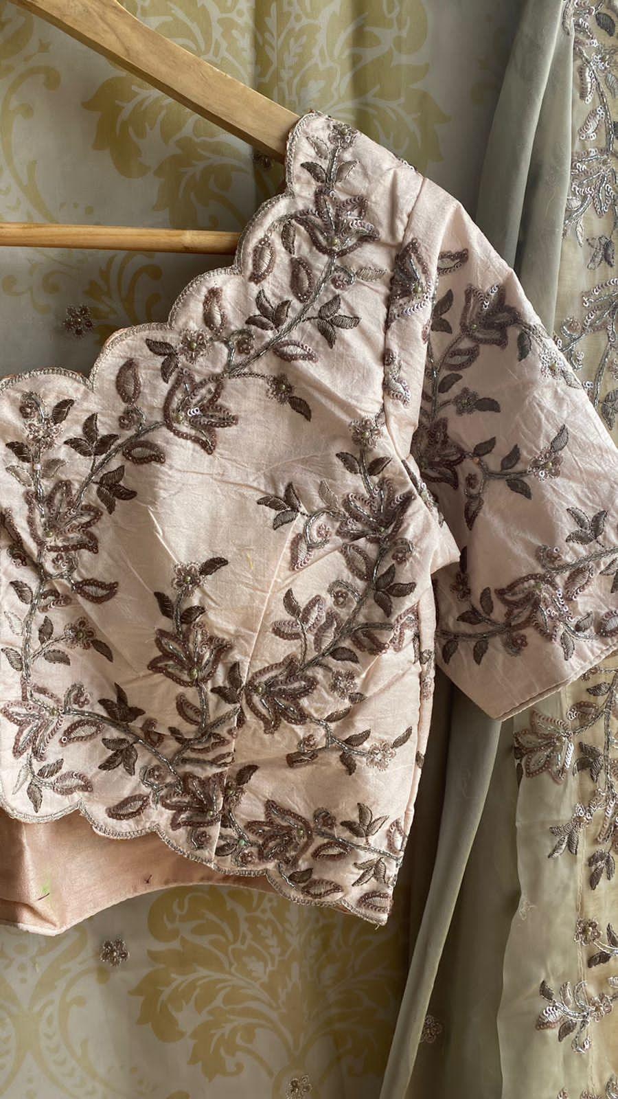 Grey organza saree with hand worked embroidery peach blouse - Threads