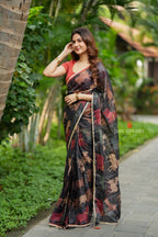 Black cow kota saree with paisley hand work blouse