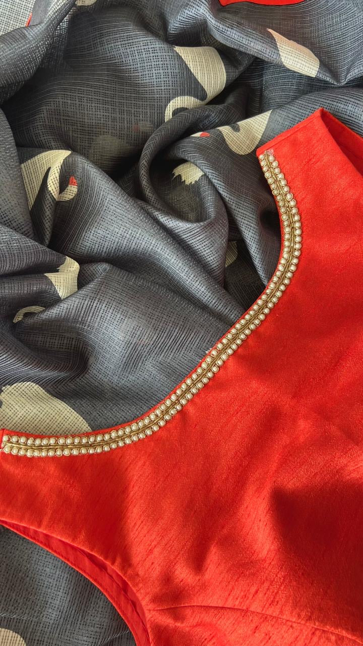 Grey kota doria saree with reddish hand worked blouse