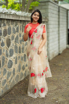Glossy organza saree with red embroidery blouse
