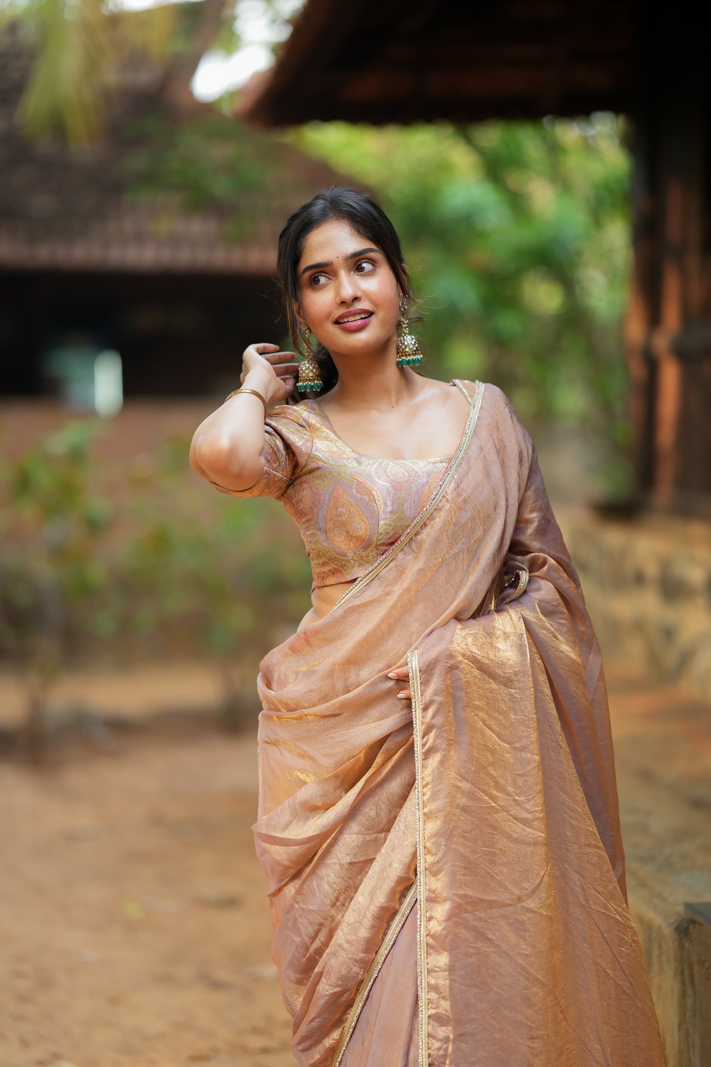 Golden peach glass tissue saree with banarasi blouse