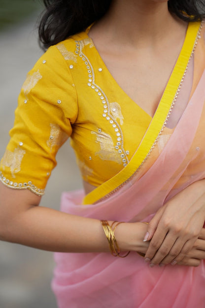 Peach organza saree with yellow hand work blouse