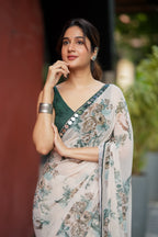 Half white chiffon floral saree with hand work blouse
