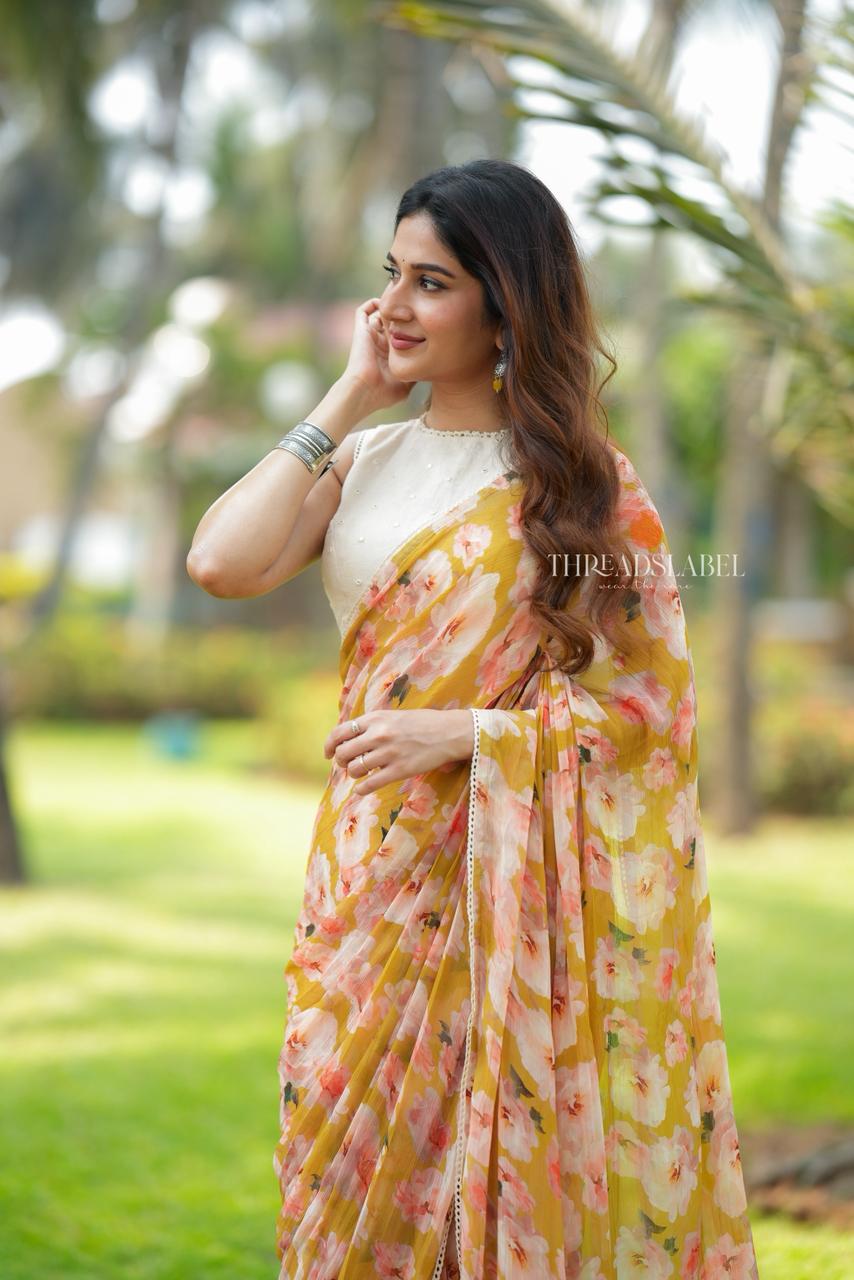 Fenugreek chiffon floral saree with linen mirror blouse