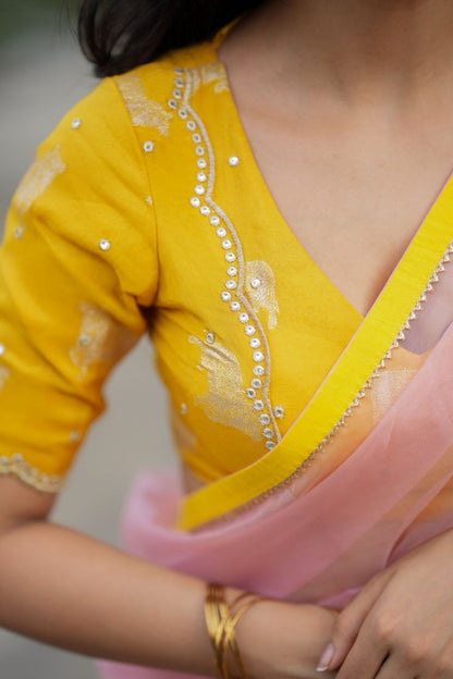 Peach organza saree with yellow hand work blouse