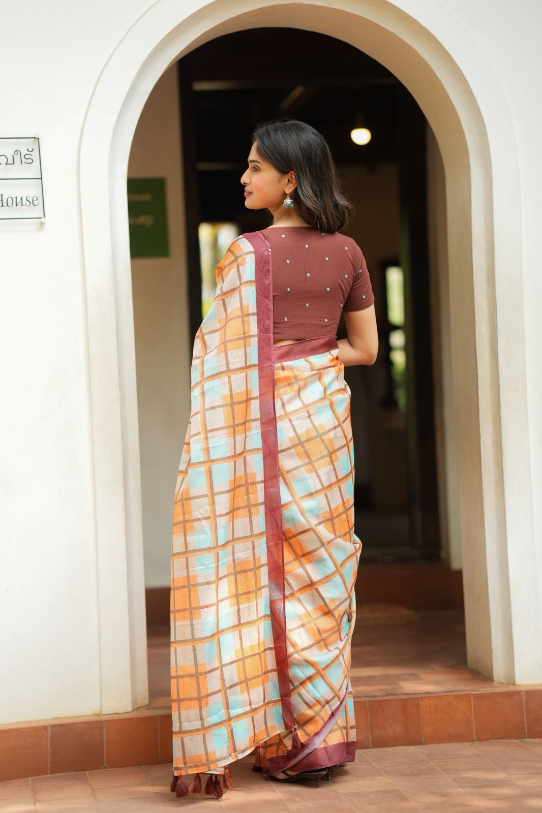 Multi checked kota saree with brown embroidery blouse