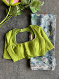 Grey floral chiffon saree with green blouse