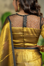 Golden soft tissue saree with hand work blouse