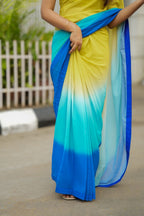 Multi georgette saree with yellow hand made blouse