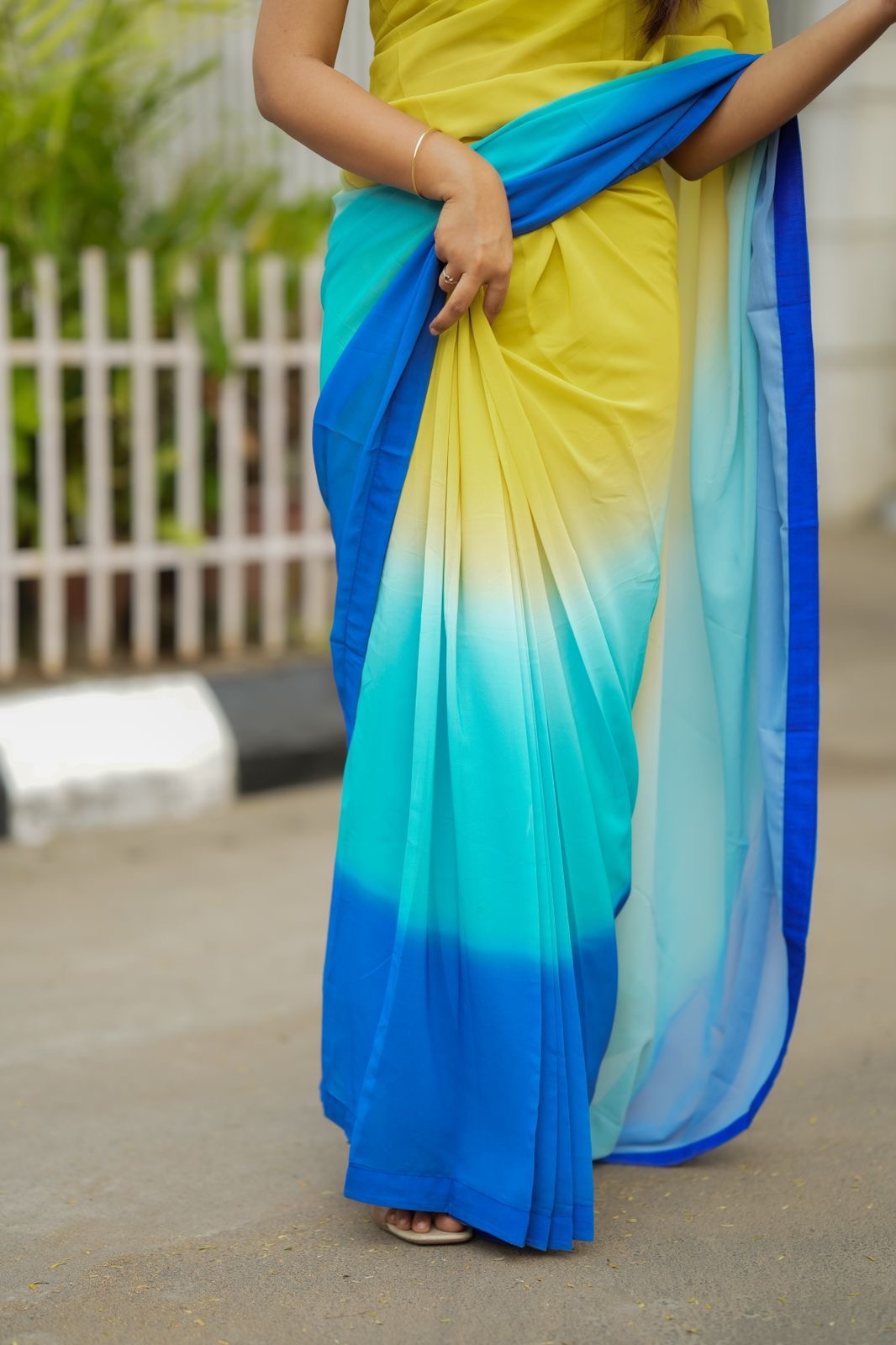 Multi georgette saree with yellow hand made blouse