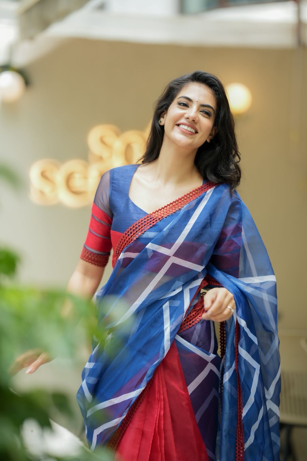Blue maroon organza saree with patterned blouse