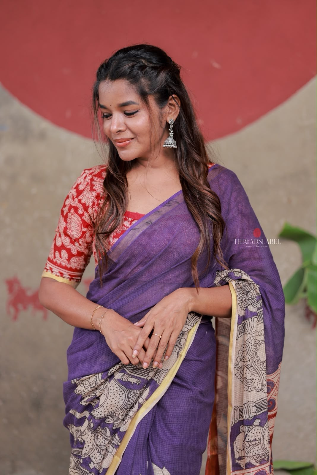 Purple kota saree with kalamkari work blouse