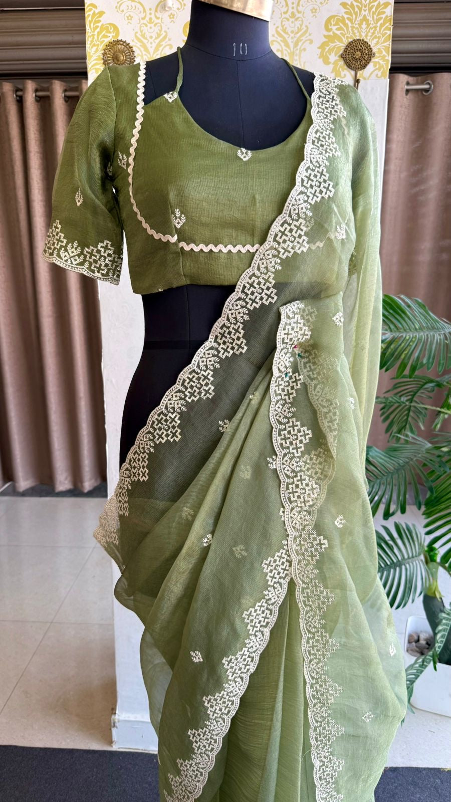 Light green tissue saree with tissue embroidery blouse