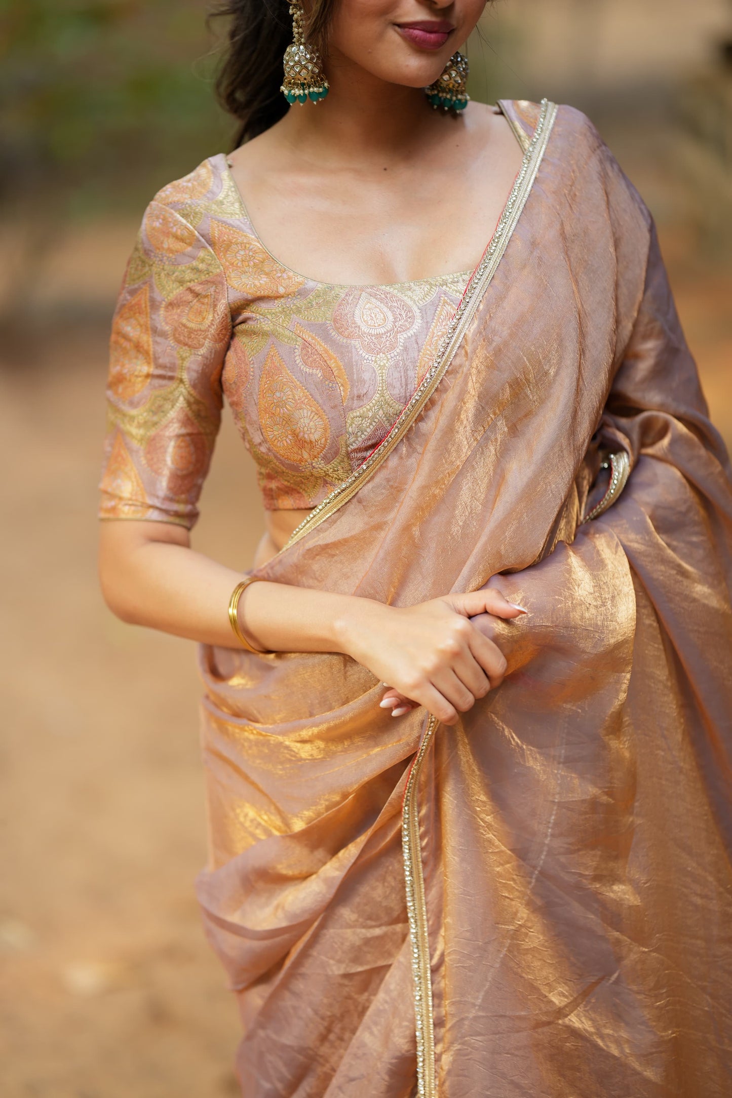 Golden peach glass tissue saree with banarasi blouse
