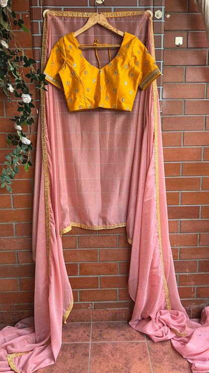 Peach organza saree with yellow embroidery blouse