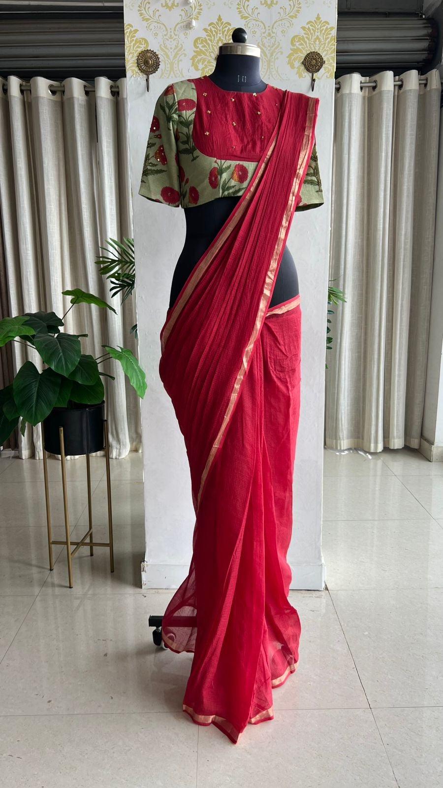 Maroon pure kota saree with green hand work blouse