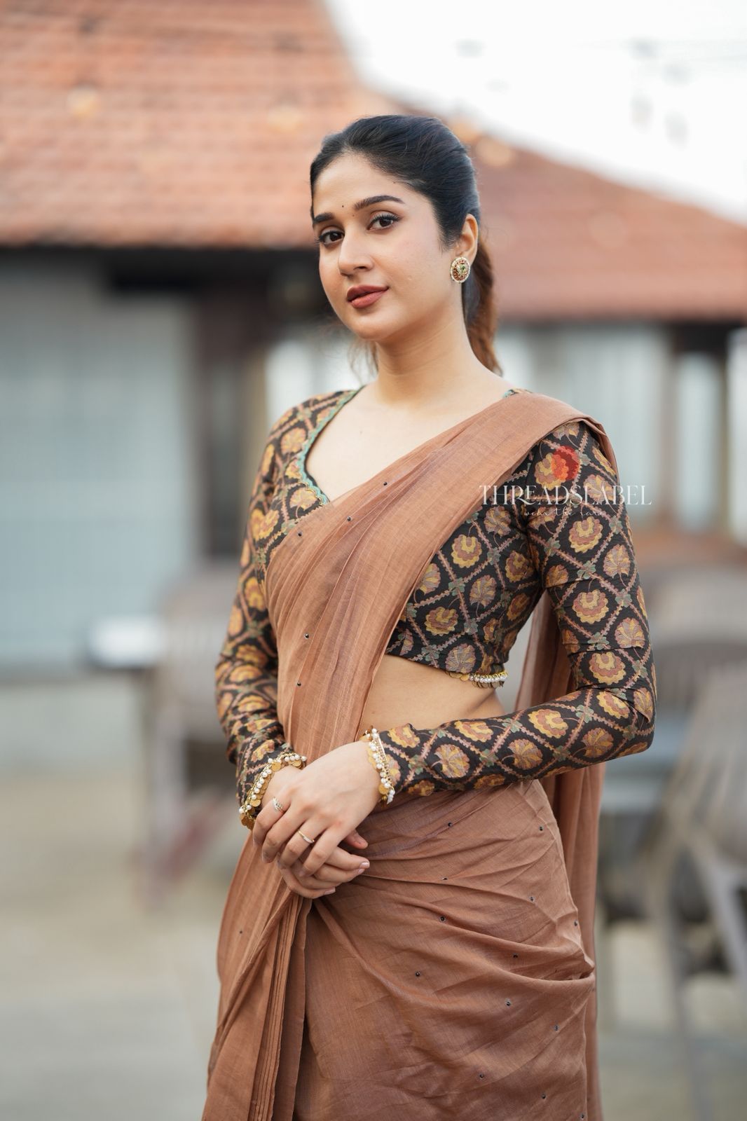 Brown malai chanderi saree with Ajrak print blouse