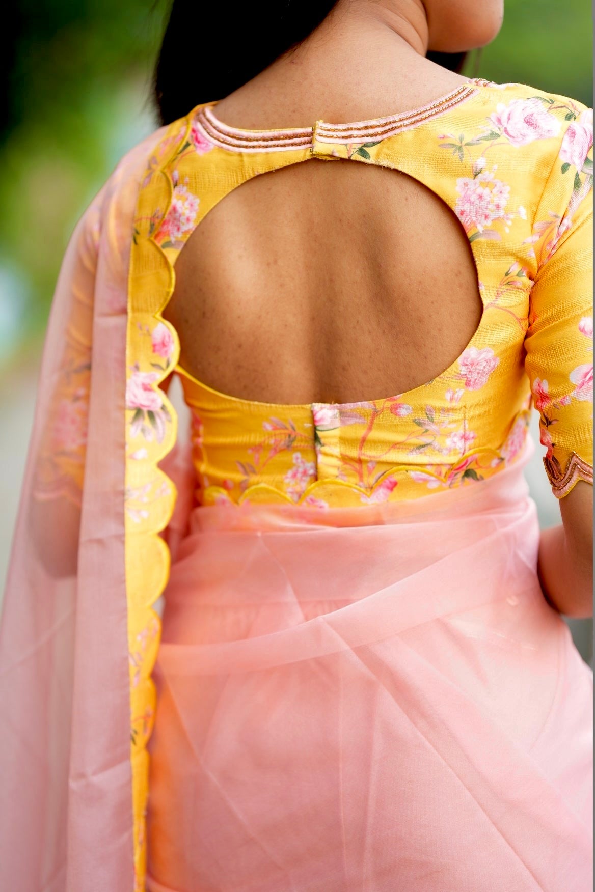 Peach organza saree with yellow floral hand work blouse