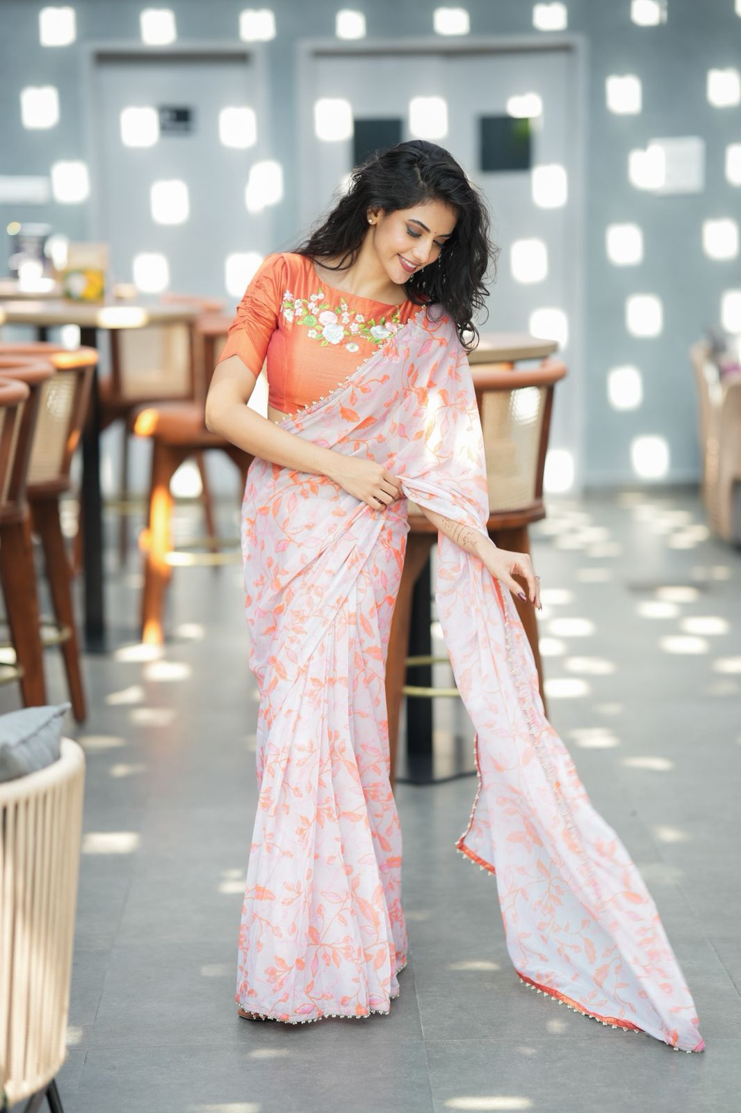 Reddish orange tissue floral hand work blouse(only blouse)