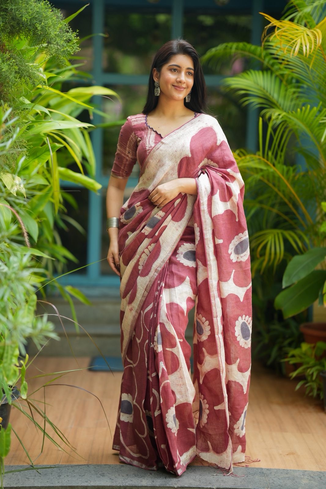 Brown linen floral saree with hand work blouse