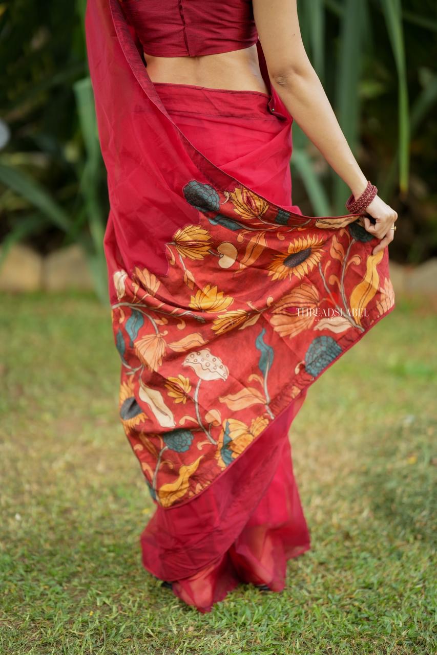 Maroon soft organza saree with kalamkari blouse