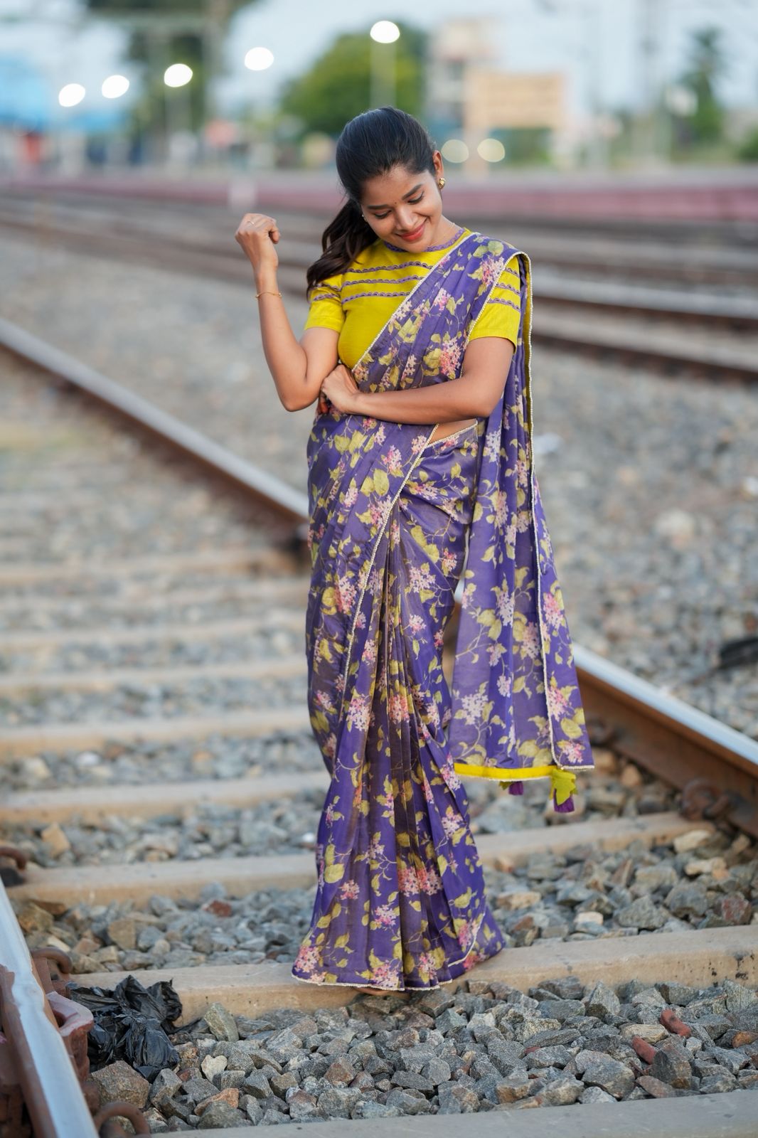 Blue floral tissue saree with lime hand work blouse