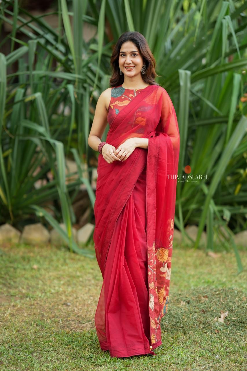 Maroon soft organza saree with kalamkari blouse