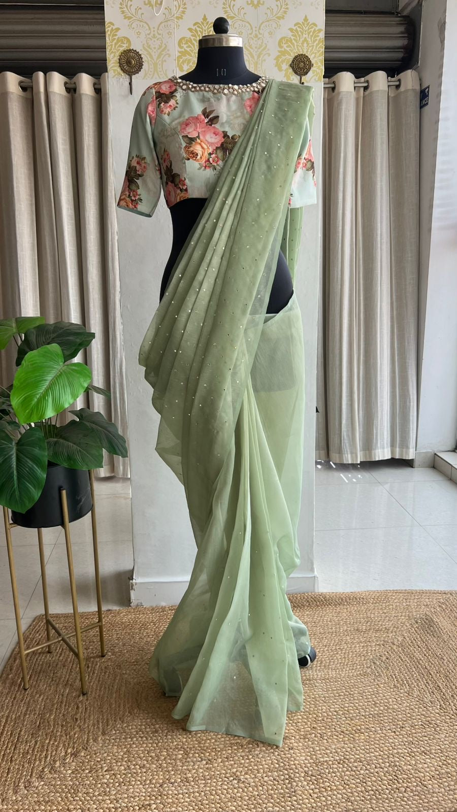 Light green tissue saree with mirror floral blouse