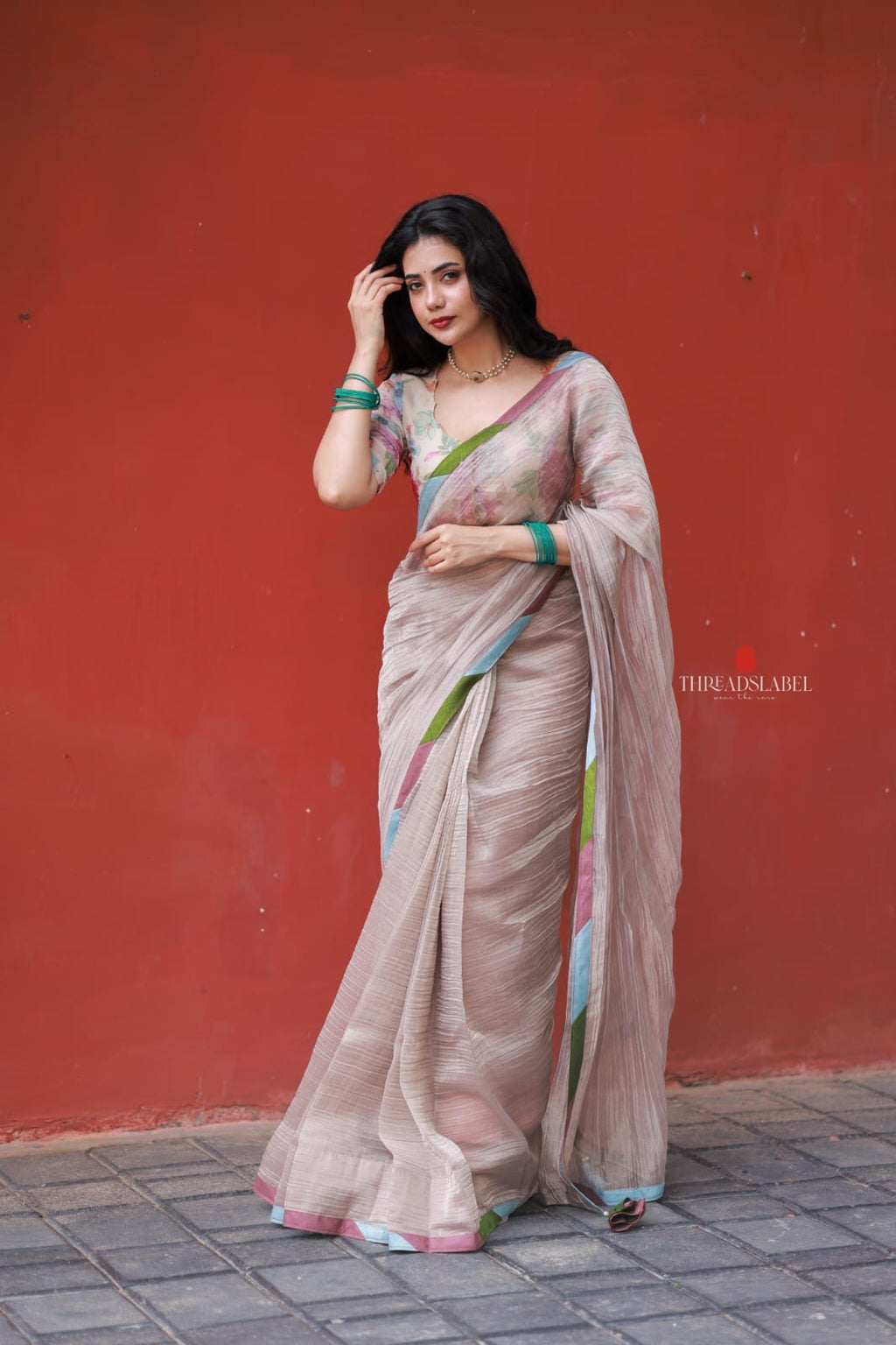 Dusty silver tissue saree with pearl hand work blouse