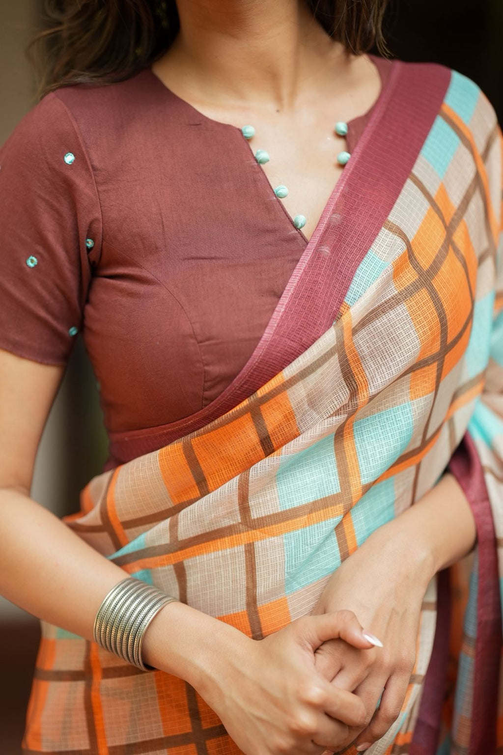 Multi checked kota saree with brown embroidery blouse