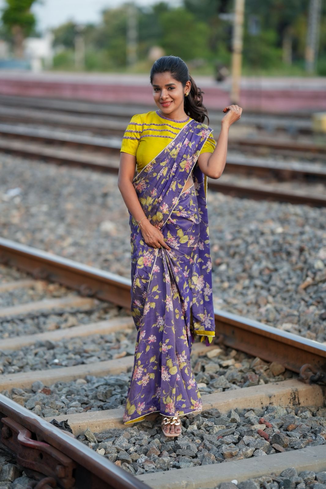 Blue floral tissue saree with lime hand work blouse