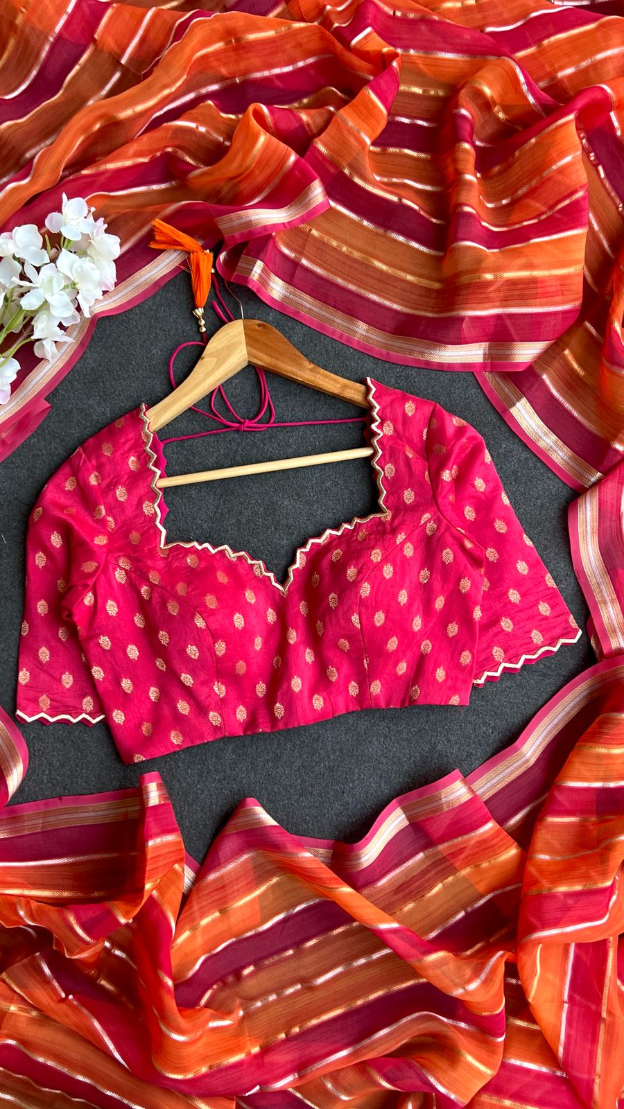 Pink & orange stripped soft organza saree with banarasi hand work blouse