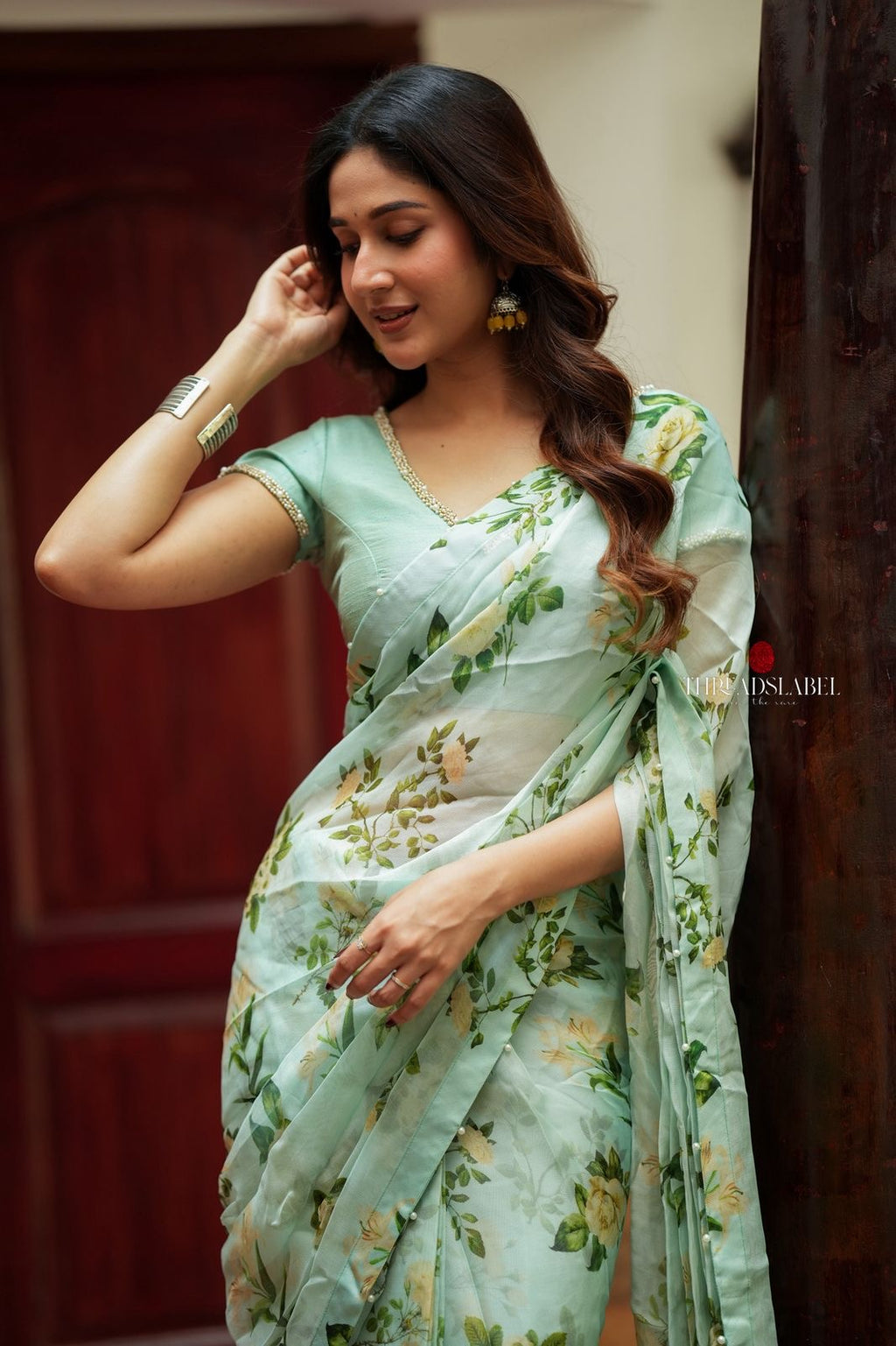 Sea green viscose jute floral saree (only saree)