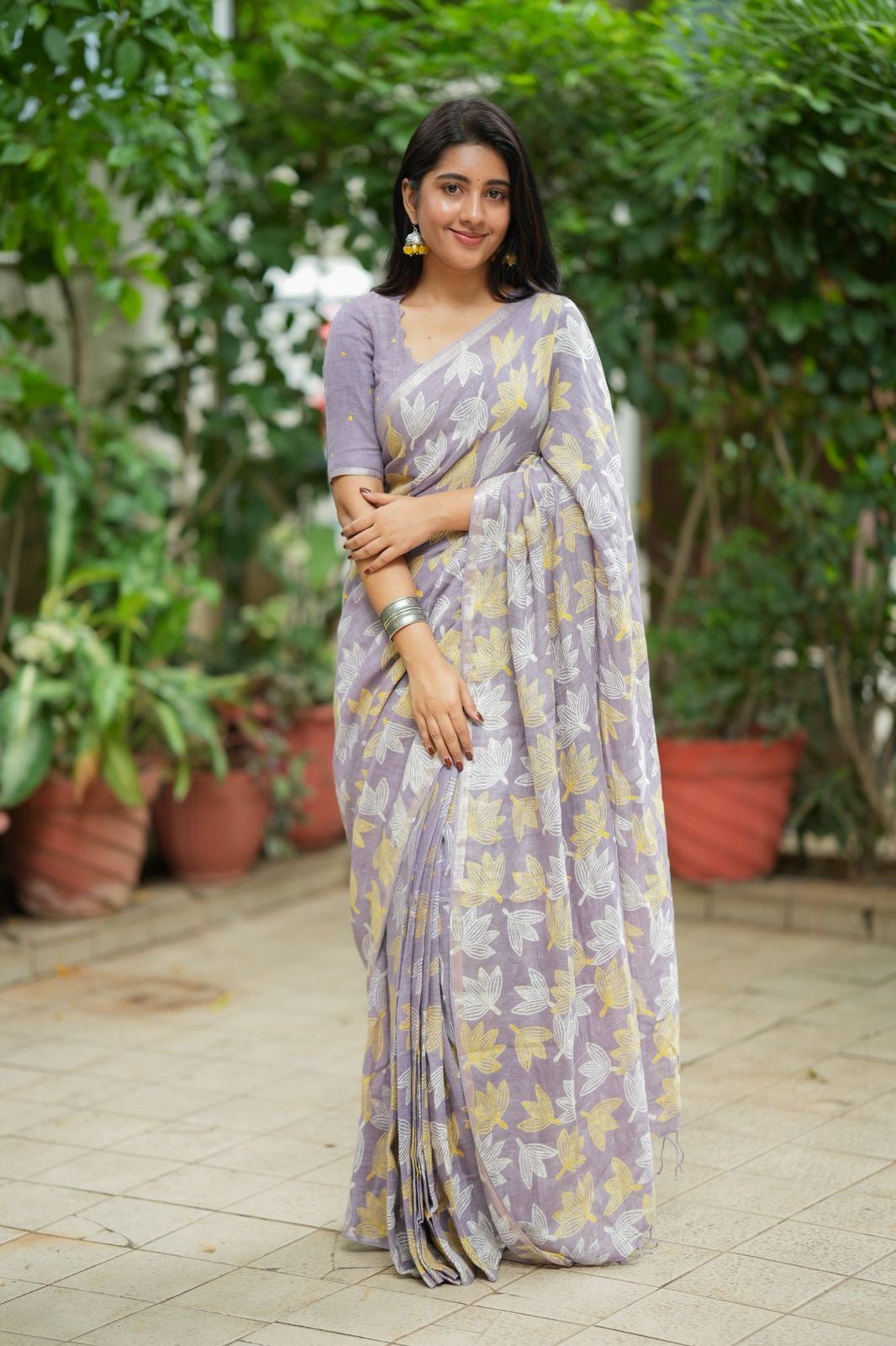 Lavender linen floral saree with hand work blouse