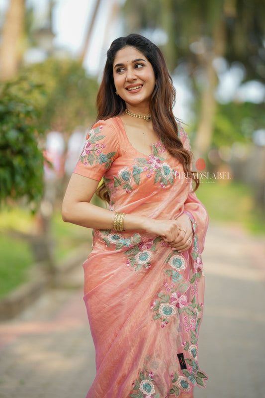 Peach soft tissue saree with embroidery blouse