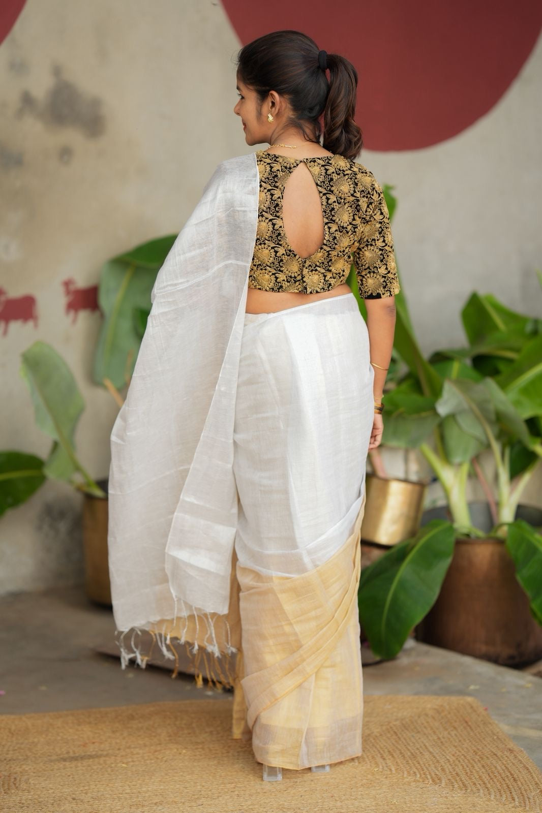 White soft tissue saree with heavy embroidery blouse