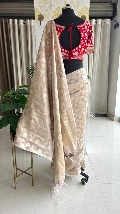 Half white banarasi saree with deep pink silk hand embroidery blouse