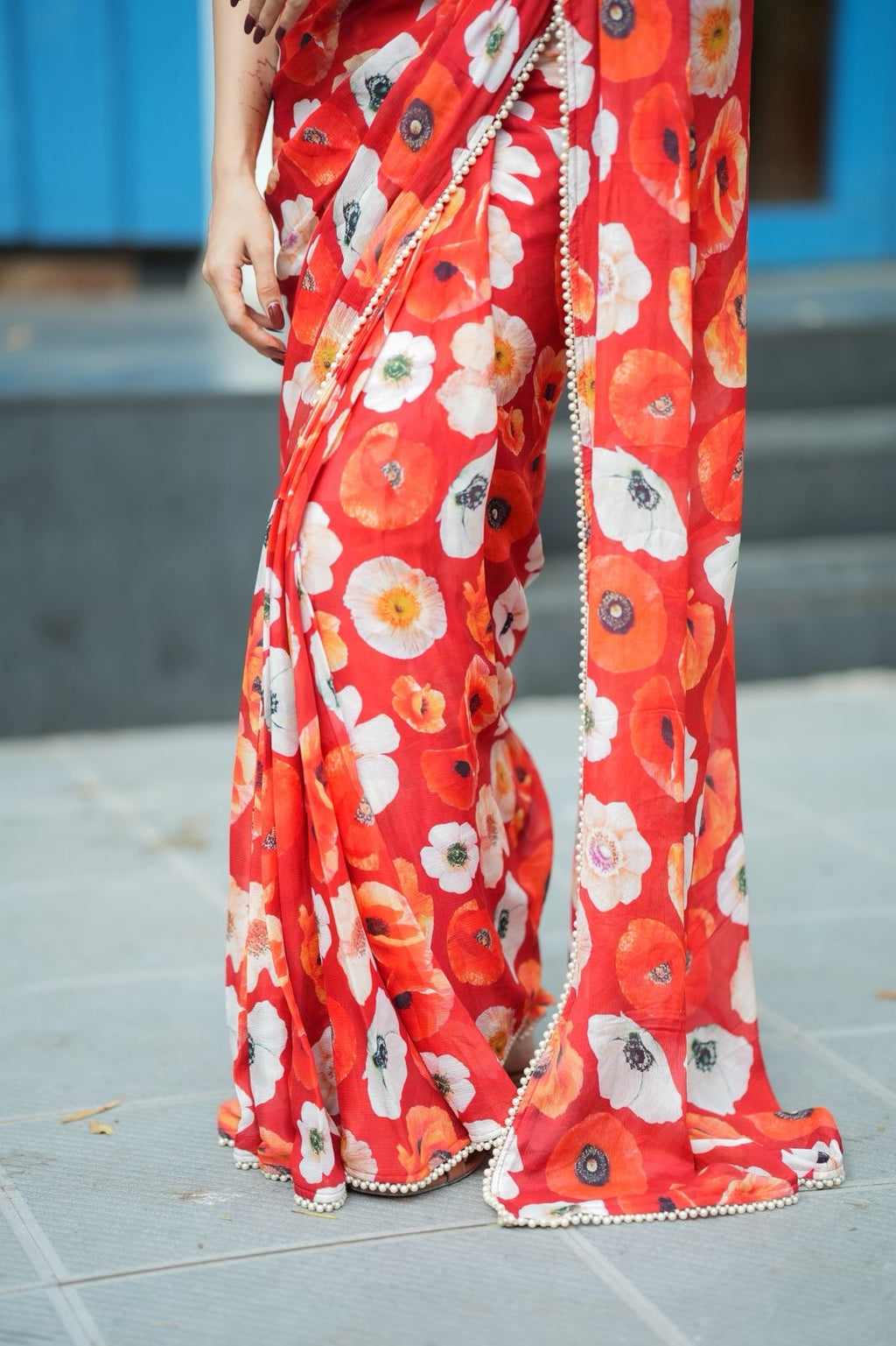 Orange red chinnon silk saree with white organza blouse