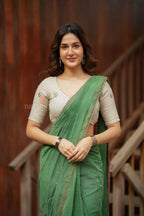 Green mul chanderi saree with halfwhite embroidery blouse